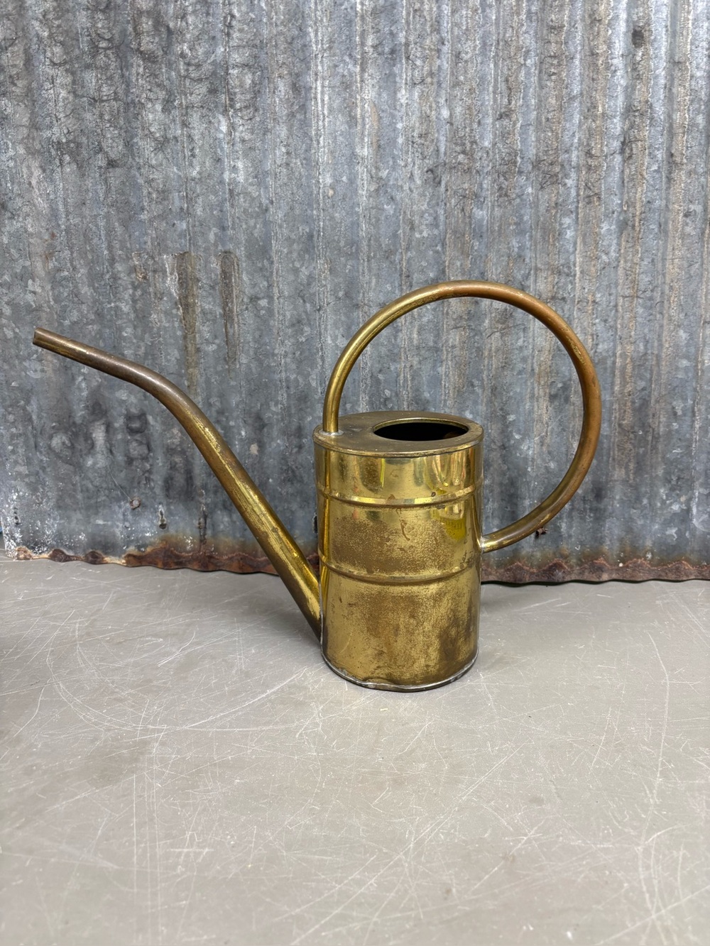 Vintage brass watering can